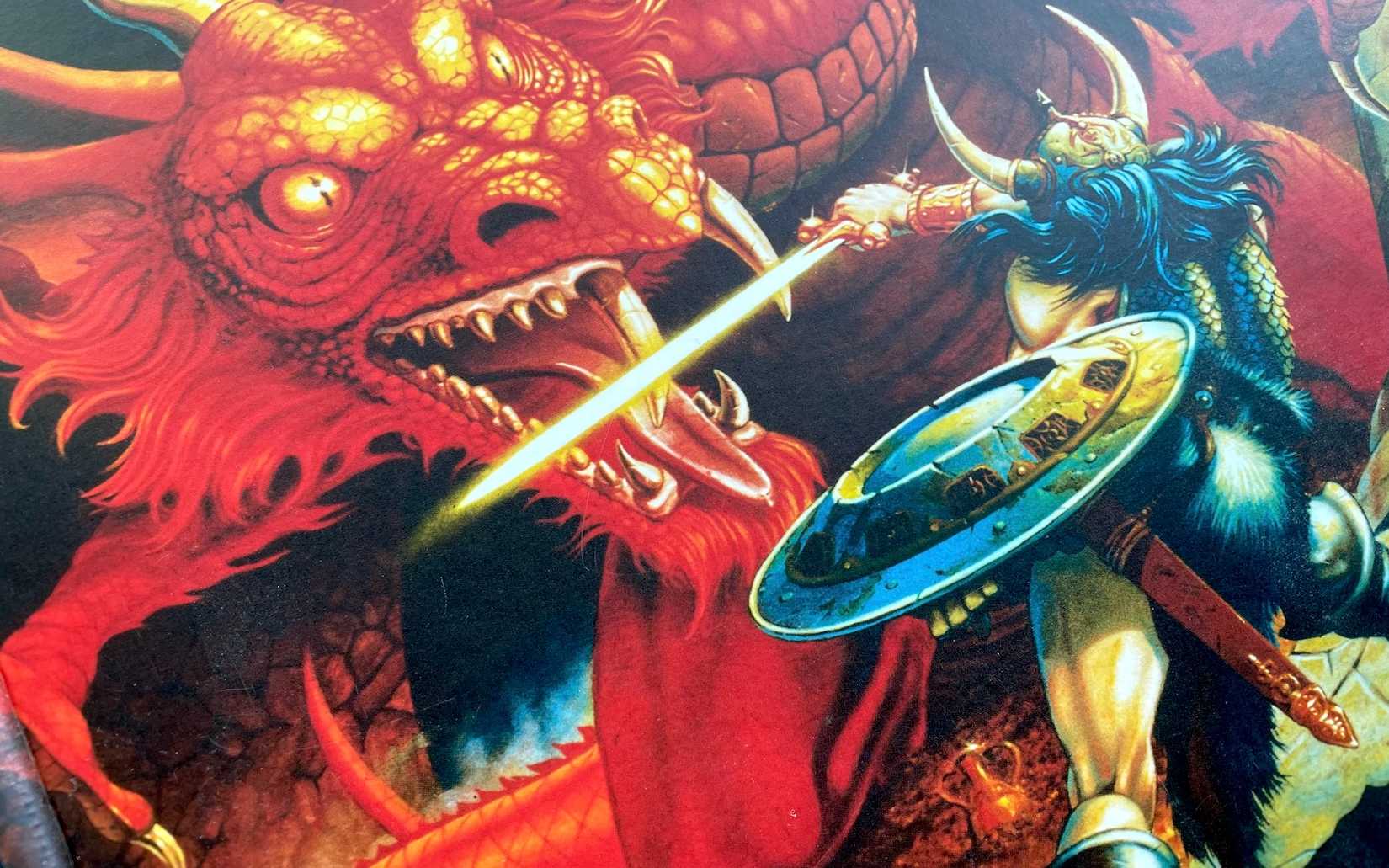 A photo of cover art for Dungeons & Dragons: Art & Arcana, featuring art from the original red box game
